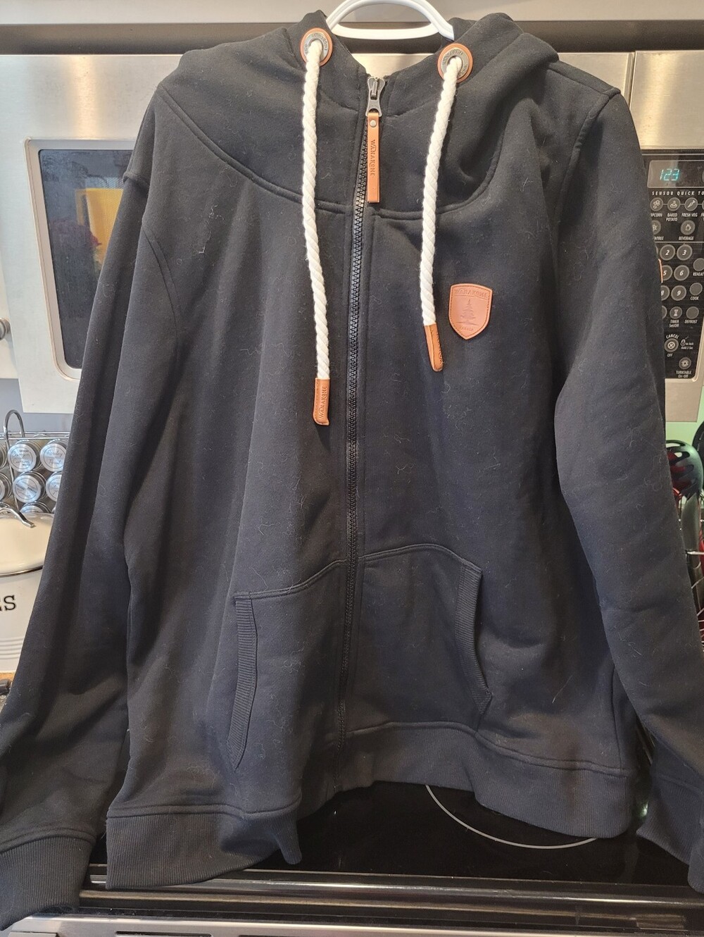 Wanakome Black Zip-Up Hoodie with White Drawcords and Tan Accents